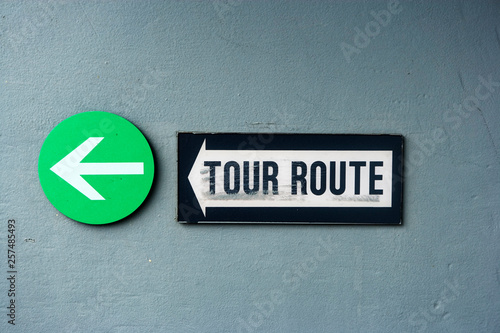 Tour route sign and arrow onboard the USS Missouri, Pearl Harbor, Honolulu, Hawaii. photo
