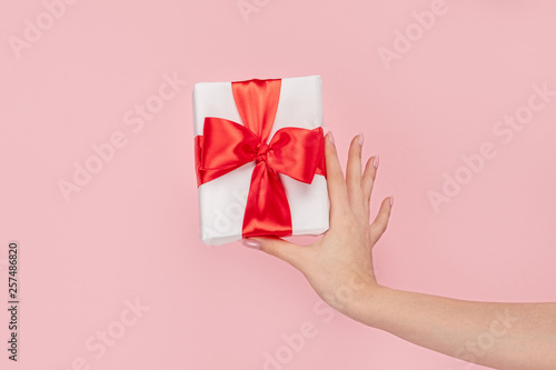 Girl with small wrapped gift box 