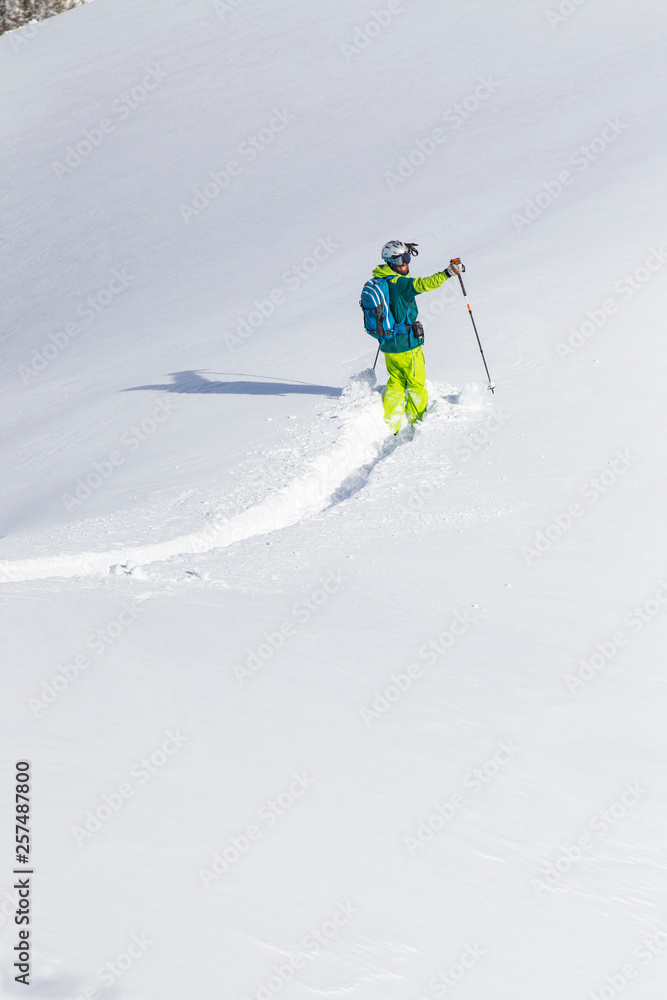 Happy Skier After Making The First Tracks In Fresh Snow Happy Skier After Making The First Tracks In Fresh Snow