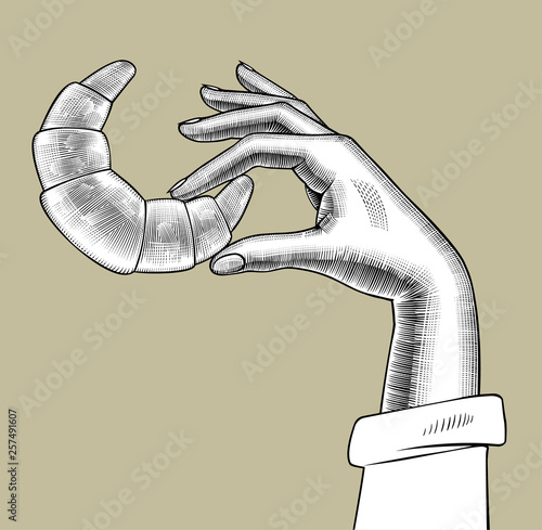 Female hand holding a bagel