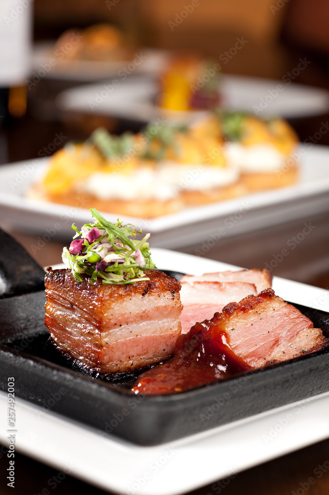 Grilled pork belly with coleslaw and spicy bbq sauce Grilled pork belly with coleslaw and spicy bbq sauce