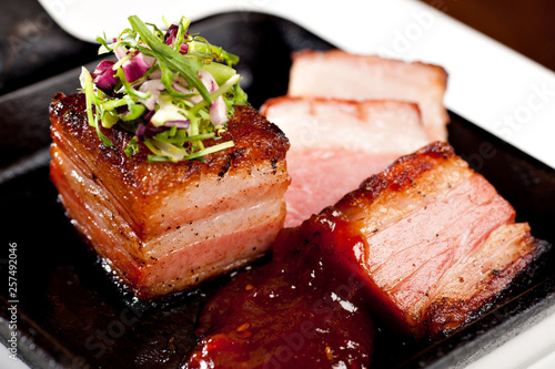 Grilled pork belly with coleslaw and spicy bbq sauce