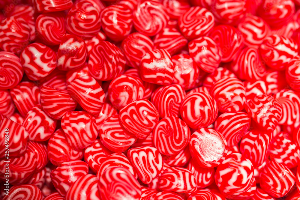 Red cabdy close up shot, high resolution texture. Red cabdy close up shot, high resolution texture.