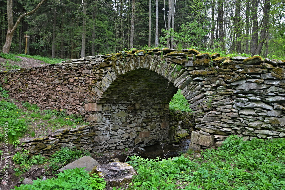 Czech Republic-stone bridge across the Golden stream of the 16th century Czech Republic-stone bridge across the Golden stream of the 16th century