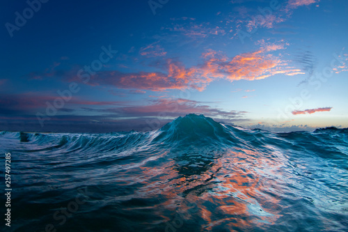 An Ocean Wave In The Early Morning Light On The East Side Of Oahu