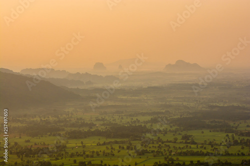 scenery during sunrise time with mountain and savannah field