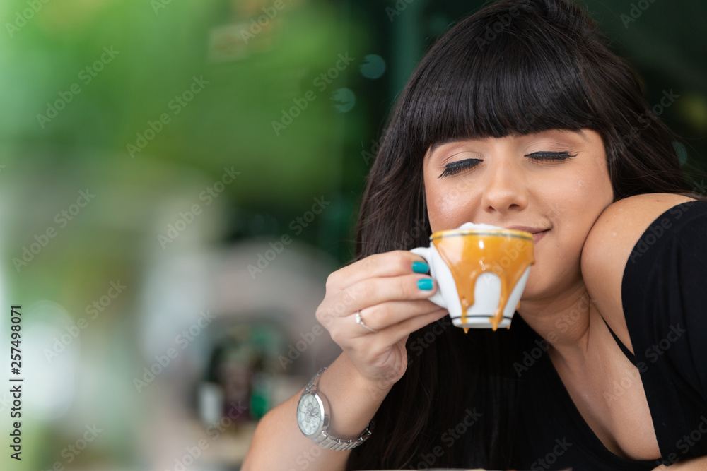Woman drinking coffee table. Women in cafe. Woman drinking coffee table. Women in cafe.