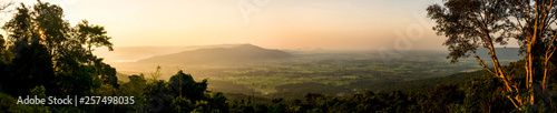 Beautiful panorama scenery during sunrise time with mountain and savannah field in Thailand