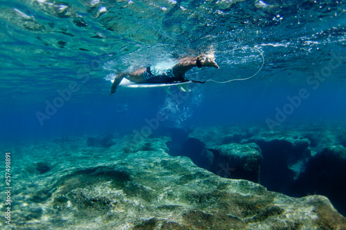 Wallpaper Mural Underwater view of surfer above reef at Pipeline, on North Shore of Oahu, Hawaii, USA Torontodigital.ca