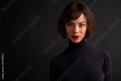 Attractive young woman studio portrait