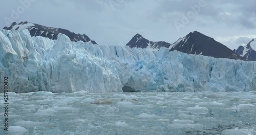 Wallpaper Mural Sailing near large blue Iceberg  Beautiful shot of sailing near large blue Iceberg and mountains in the arcticin 4K resolution Torontodigital.ca