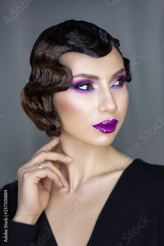feminine image and films of the 1920s  glamorous girl with purple lips  and Finger wave hairstyle