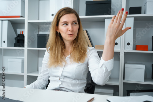 portrait of young beautiful brunette businesswoman work in office like her job