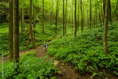 A woman hiking in Virgin Falls State Natural Area, Sparta, Tennessee. photo