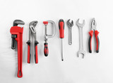 Flat lay composition with construction tools on white background