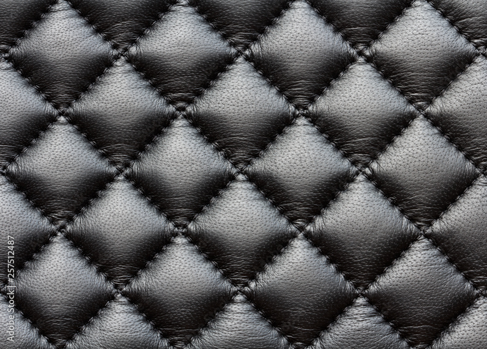 Fototapeta premium black leather texture, sewn stitches, macro