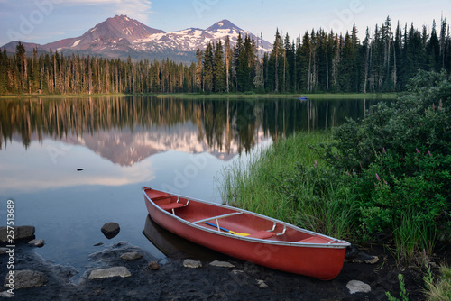 Red canoe by Scott Lake, Oregon, USA