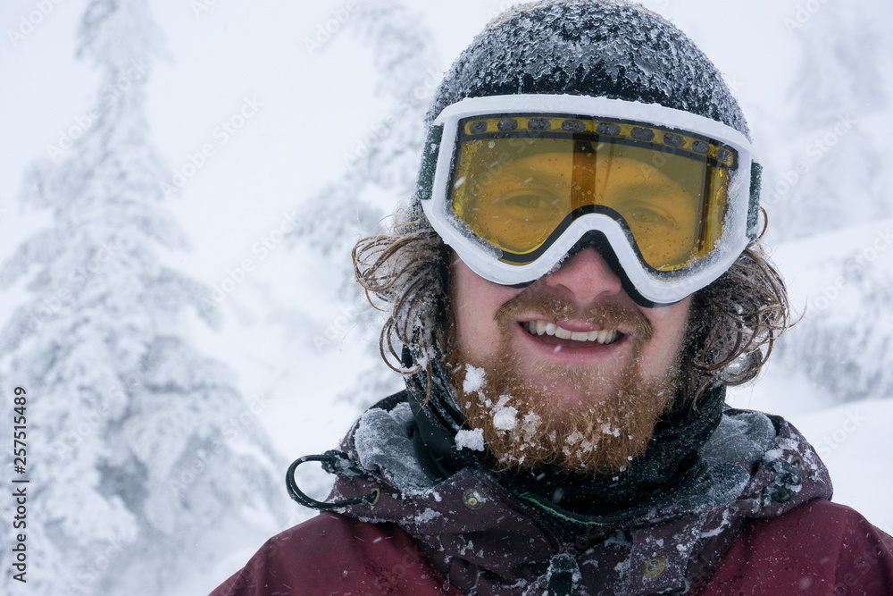 Portrait of snowboarder during a snowstorm Portrait of snowboarder during a snowstorm