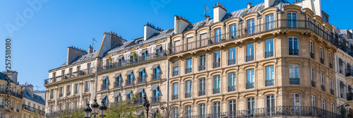 Paris, beautiful building in the Marais, typical parisian facade and windows