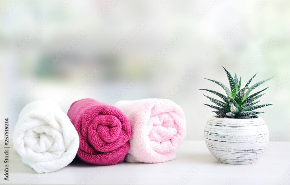 Rolled towels on table empty space background. Rolled towels on table empty space background.