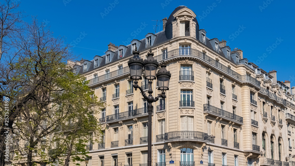 Paris, beautiful building in the Marais, typical parisian facade and windows rue Saint-Martin