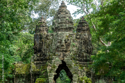 The magnificent North Gate of the Bayon temple complex near Angkor Wat in Cambodia photo