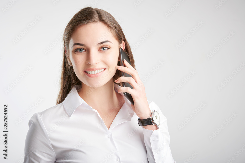 Young businesswoman with her handy Young businesswoman with her handy