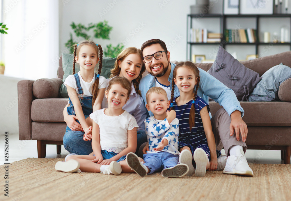 happy large family mother father and children at home. happy large family mother father and children at home.