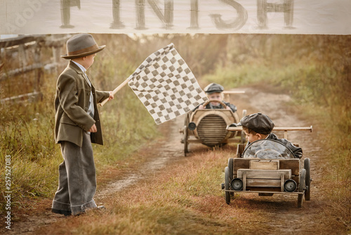 Finish the race between the boys on self-made cars © Alexandr Vasilyev