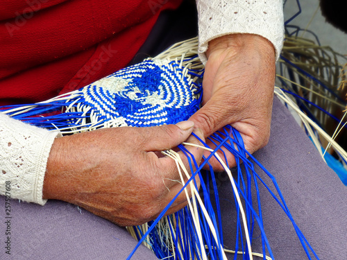 Traditional weaving of ecuadorian Panama Hat or Paja  Toquilla Straw Hats, UNESCO Intangible Cultural Heritage of Humanity