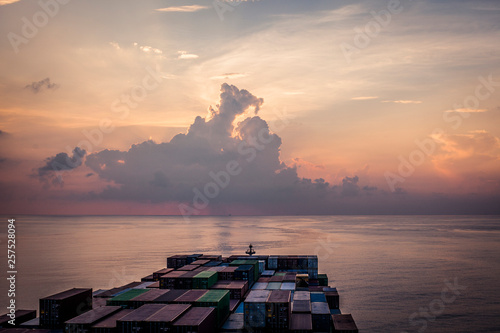 Container Ship During Sunset In The Indian Ocean photo