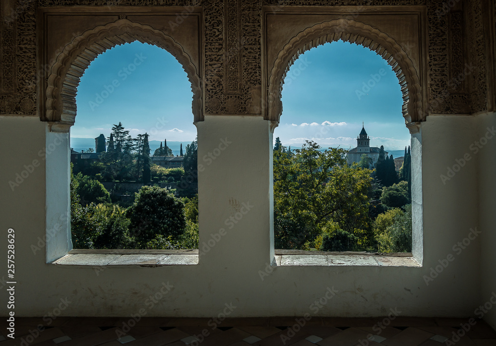  Arab windows of the Alhambra of Granada with beautiful views. Spain
