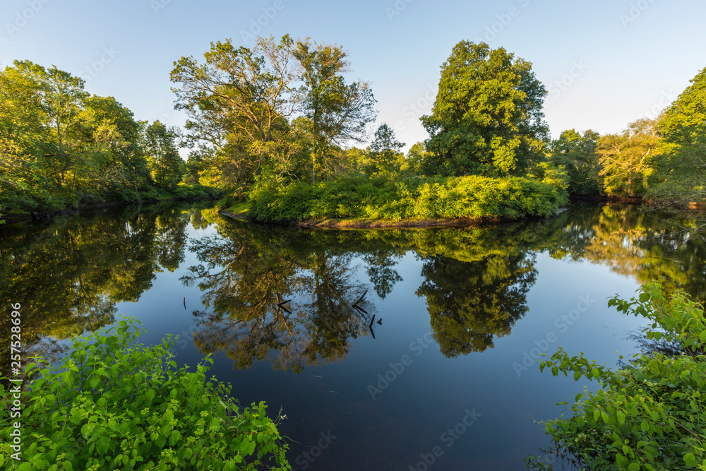 Early morning on the Taunton River at a Wildlands Trust preserve in Raynham, Massachusetts. Early morning on the Taunton River at a Wildlands Trust preserve in Raynham, Massachusetts.