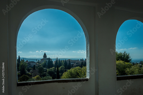  Arab windows of the Alhambra of Granada with beautiful views. Spain