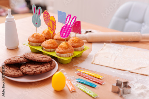 Set of cakes standing on table in the kitchen