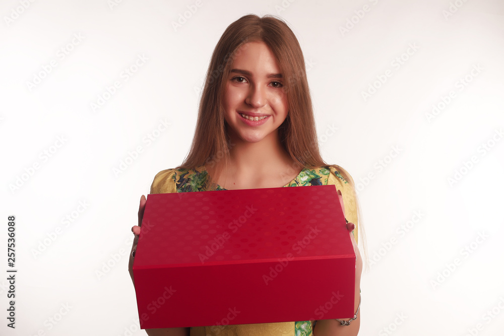 The portrait of an young blonde lady isolated over a white background The portrait of an young blonde lady isolated over a white background