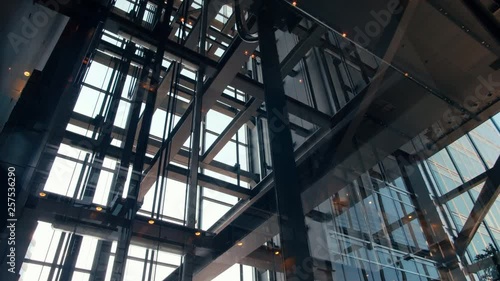 Wallpaper Mural Moving Elevators in Modern Office Business Building Going Up and Down in Transparent Glass Lift Shaft in Skyscraper or Shopping Center Torontodigital.ca