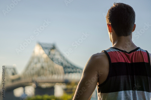 Two friends rock climbing together on summer day photo