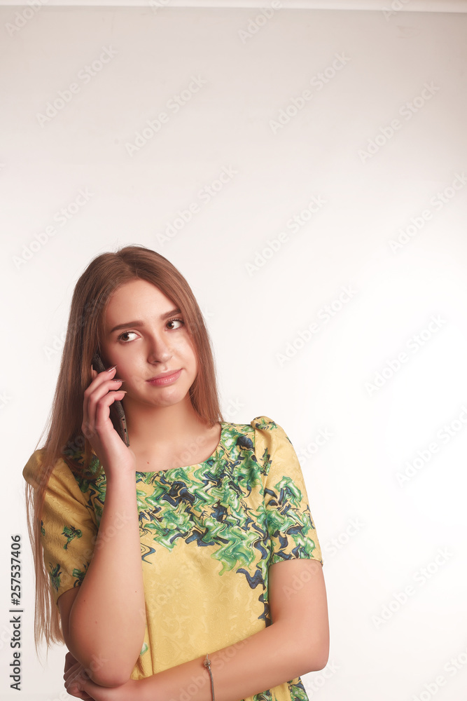The portrait of an young blonde lady isolated over a white background The portrait of an young blonde lady isolated over a white background