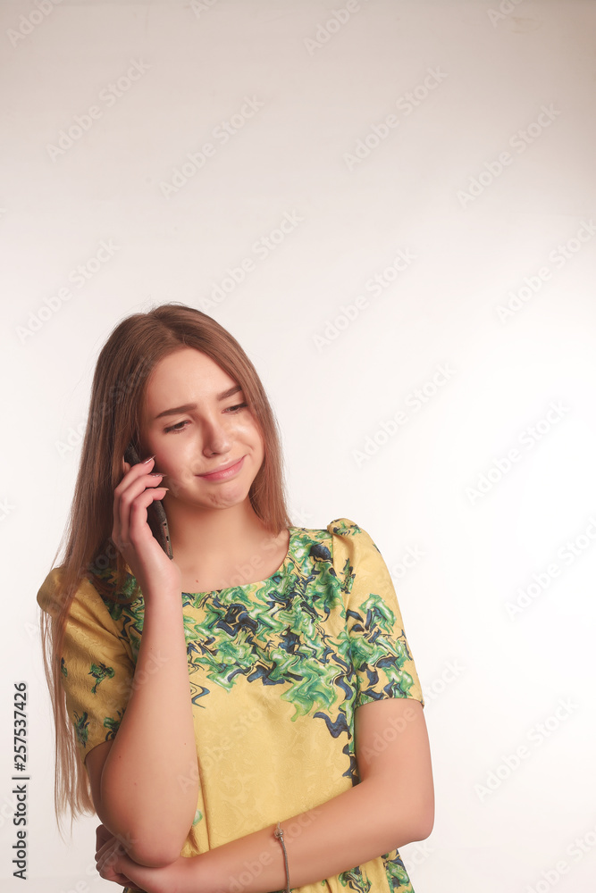 The portrait of an young blonde lady isolated over a white background The portrait of an young blonde lady isolated over a white background