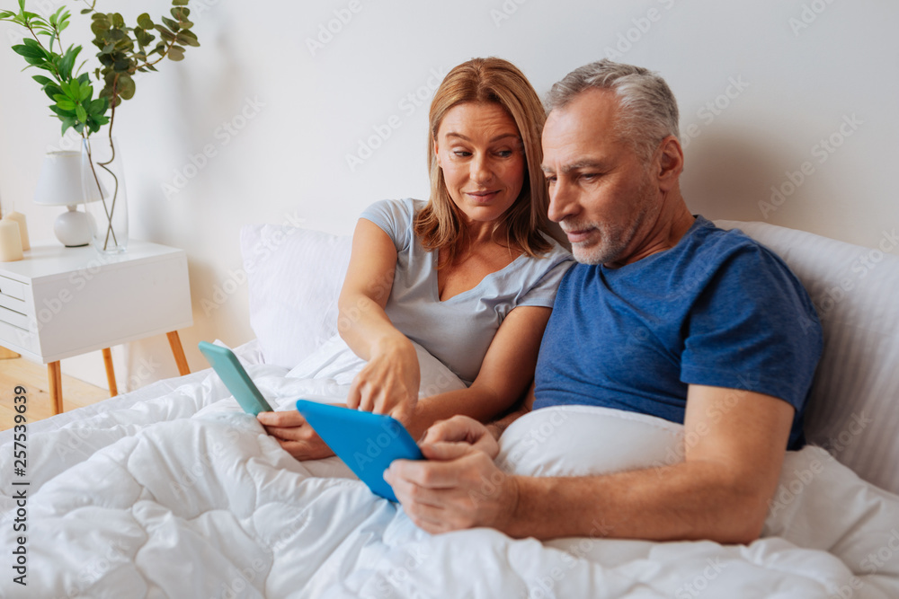 Wife recommending best variant for husband shopping online Wife recommending best variant for husband shopping online