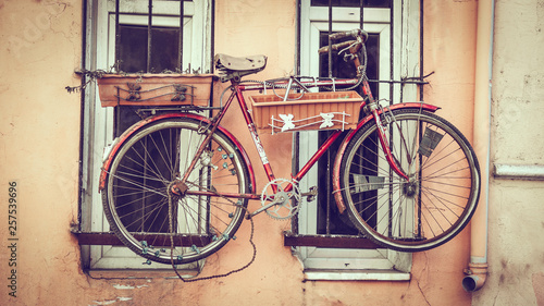  Old decorative bicycle on window