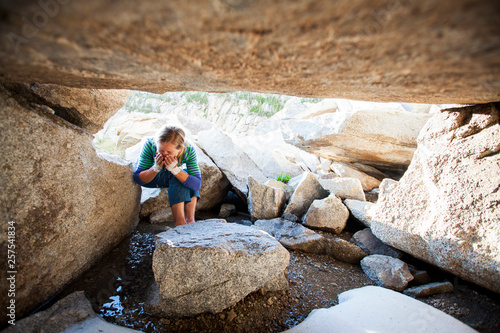 A woman rinsing off after a long day of climbing. Lone Peak Cirq, Utah photo