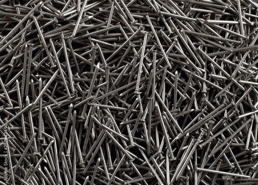 Construction, repair, tools - Pile nails background Stock Photo | Adobe  Stock