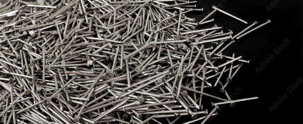 Construction, repair, tools - Pile nails black background Construction, repair, tools - Pile nails black background