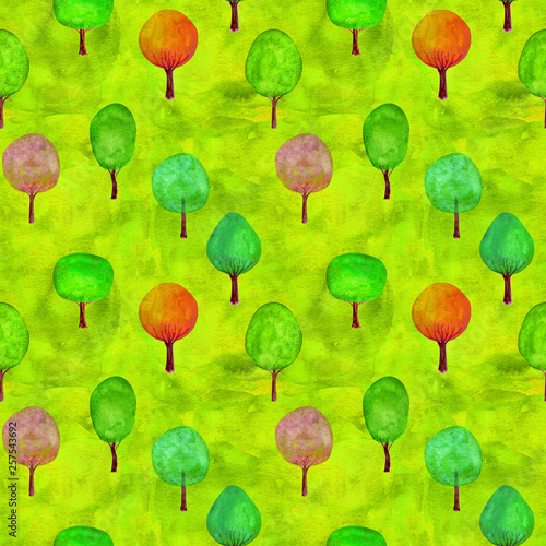 Seamless pattern of watercolor colorful trees on green grass background