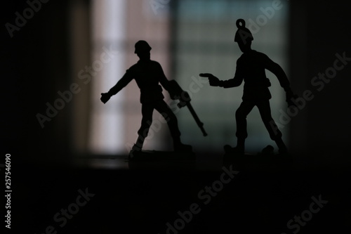silhouette of soldier in combat position