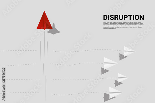 red origami paper airplane is move different direction from group of white. Business Concept of disruption and niche marketing