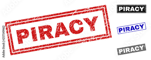 Grunge PIRACY rectangle stamp seals isolated on a white background. Rectangular seals with grunge texture in red, blue, black and grey colors.