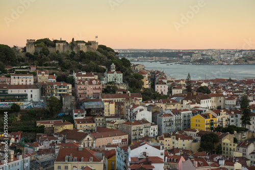 sunset with historic city center castle and river